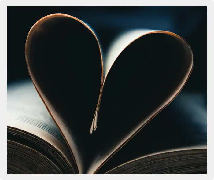 A book with pages folded into the shape of a heart.